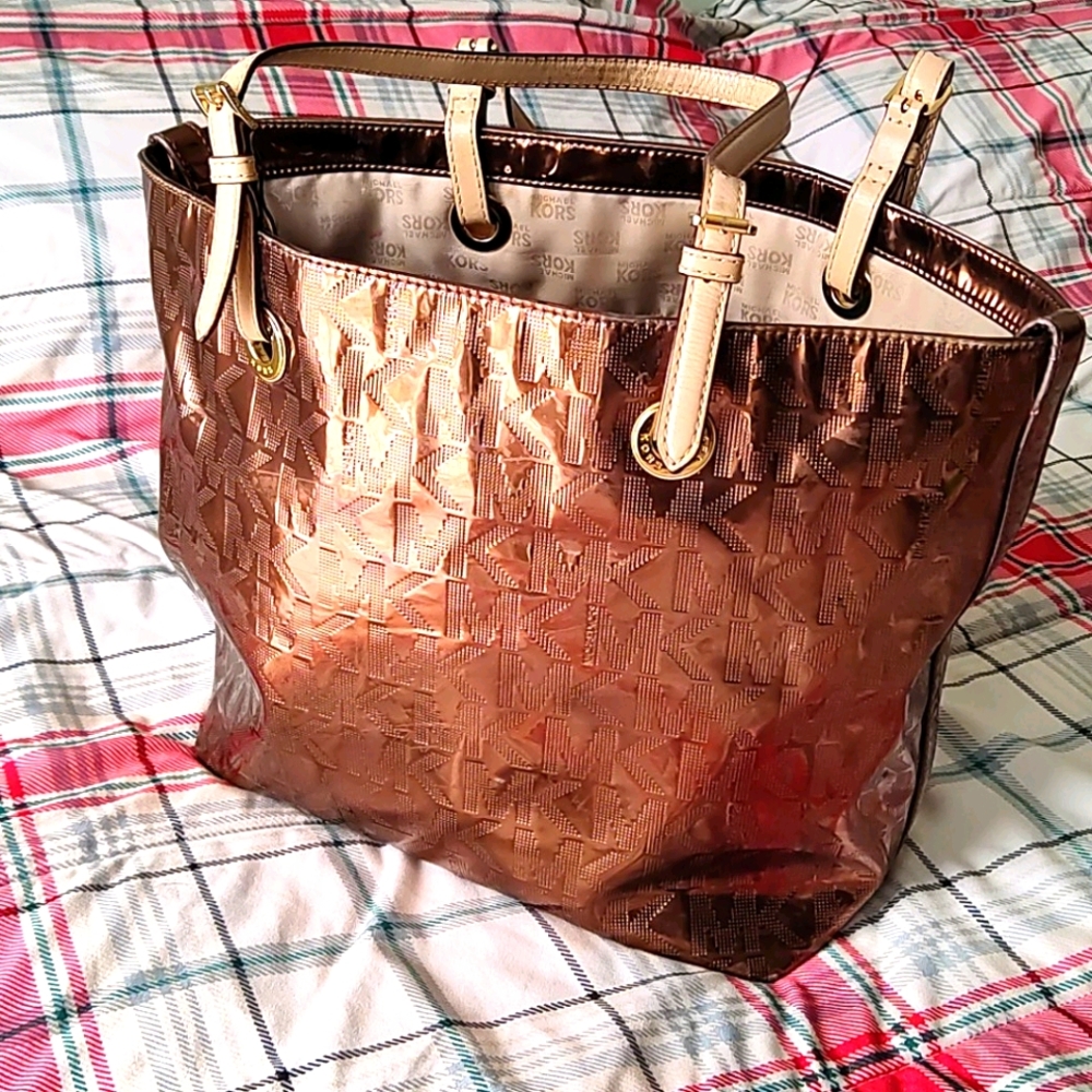 MK metallic brown purse